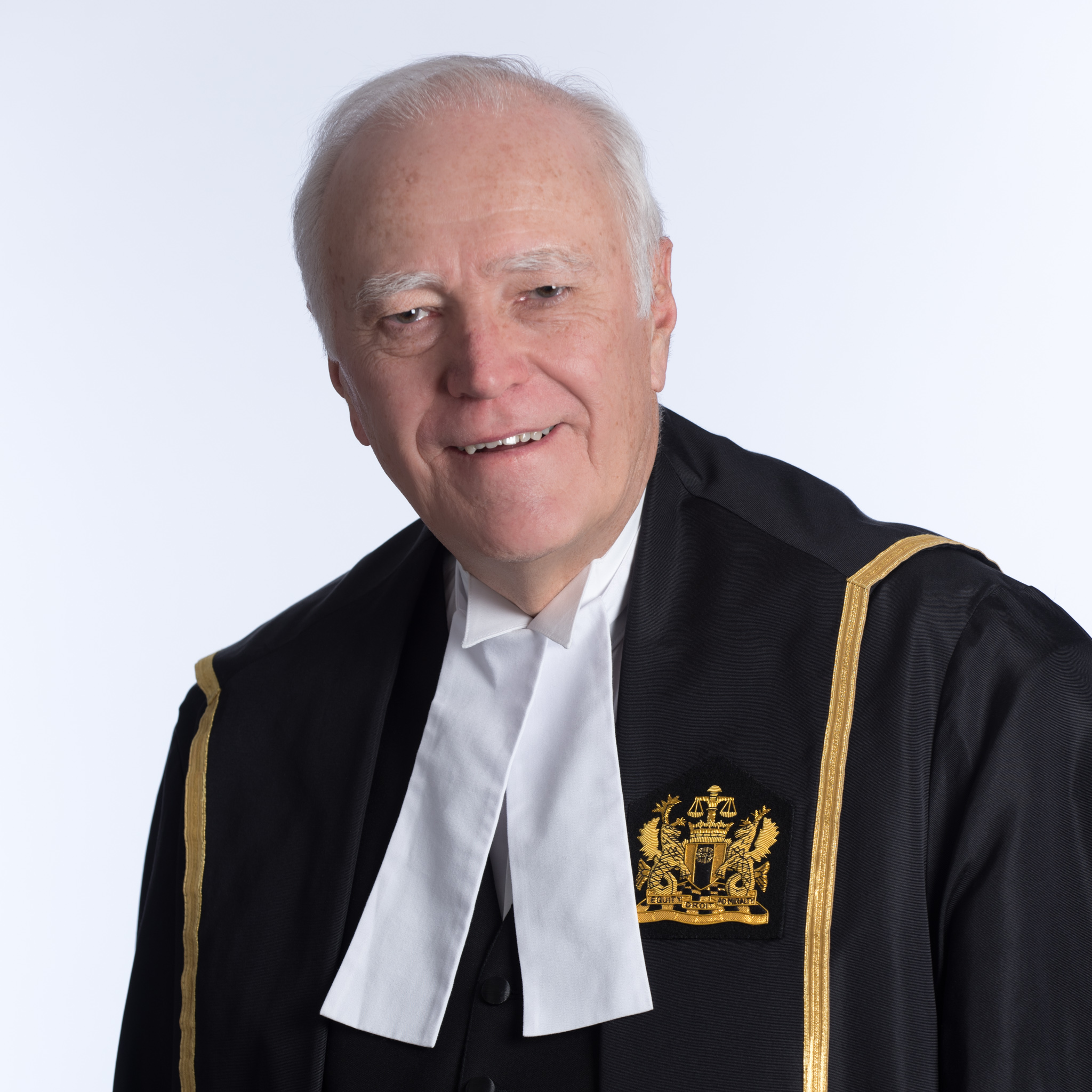 Hon. Justice Richard G. Mosley (*)